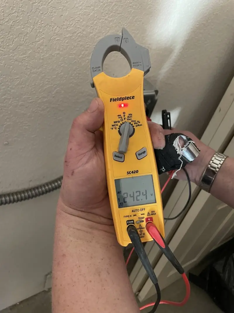 Voltage testing with clamp meter during Generator Installation in Roseville